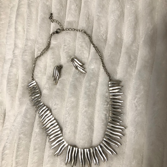 Jewelry - Silver necklace with matching earrings.